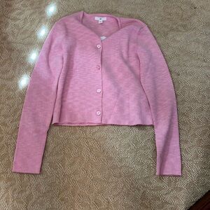 Woman’s pink ribbed cotton short waisted sweater